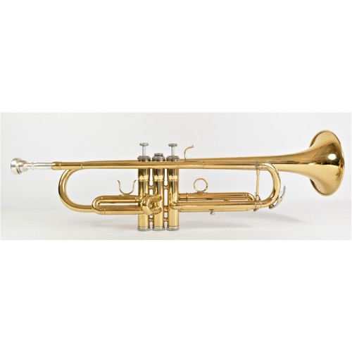 204 - A Jazzo trumpet with silver plated mouth piece, mother of pearl inlay buttons, white cotton gloves a... 