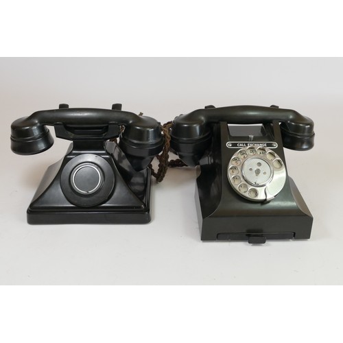 205 - A Call Exchange bakerite telephone (model No 312F PL52/3A), with pull out paper tray and braided cab... 