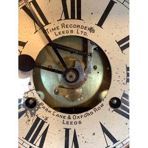 210 - A wall mounted clocking in machine, Time Recorders Leeds Ltd, Park Lane & Oxford Row, Leeds, mahogan... 