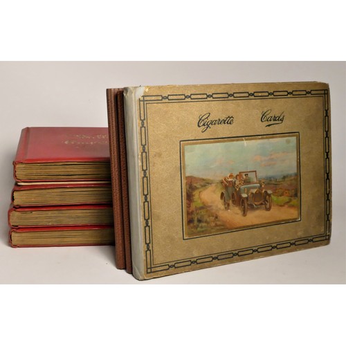 253 - Four Will's cigarette card albums, fabric backed, comprising of cards depicting botanicals, naval sh... 