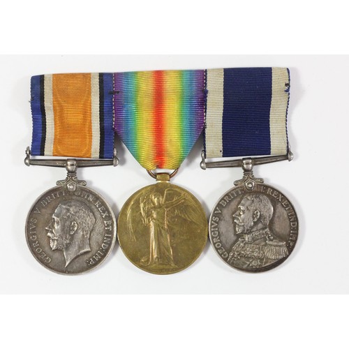 284 - WWI Naval group of three, mounted on a bar, Long Service, H.M.S. Pembroke, Victory and War Medals, a... 