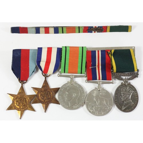 286 - WWII group of five, mounted on bar, Territorial Medal awarded to 2052182 W.O. CL. 2,  C.D. Gordon R.... 