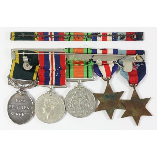 286 - WWII group of five, mounted on bar, Territorial Medal awarded to 2052182 W.O. CL. 2,  C.D. Gordon R.... 