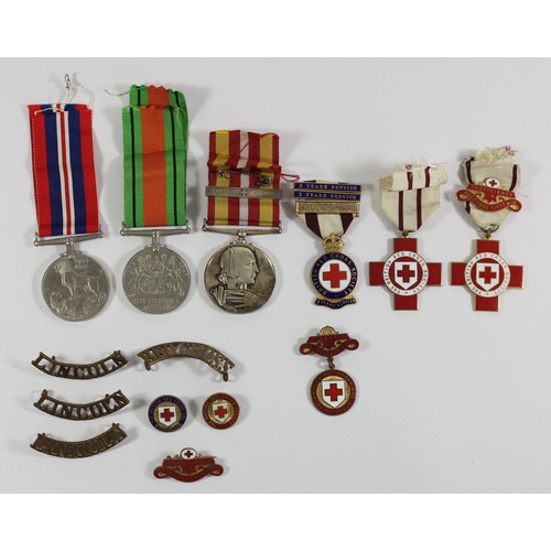 291 - A collection of British Red Cross medals and badges, including medals awarded to Mrs Mabel Salsbury