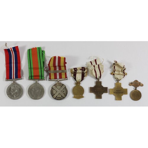 291 - A collection of British Red Cross medals and badges, including medals awarded to Mrs Mabel Salsbury