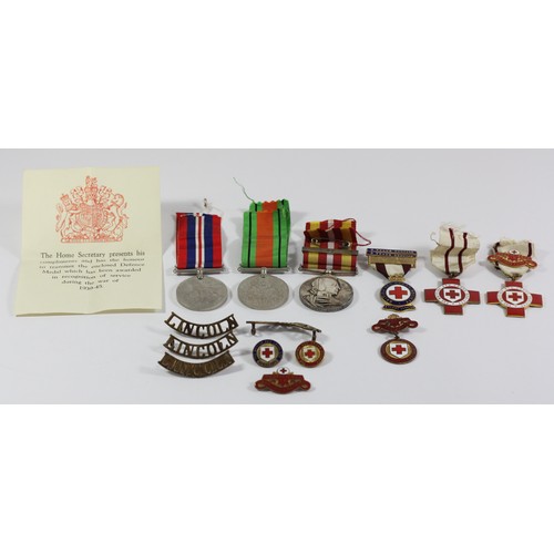 291 - A collection of British Red Cross medals and badges, including medals awarded to Mrs Mabel Salsbury