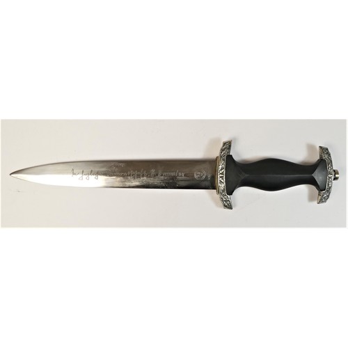 307 - A German Third Reich style SS Honour dagger, inscribed to blade and marked RZM M7/36, 22 cm, scabbar... 