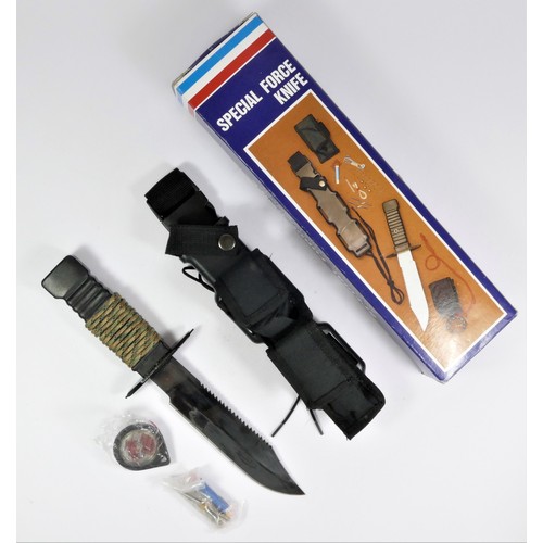 305 - A Special Force Knife, made in Taiwan, contains a Bowie style knife, 18.5 cm blade, 12.5cm grip, poc... 