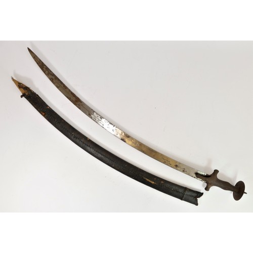 306 - An Indian Tulwar/Talwar sword, with simple crossguard, baluster grip, disc pommel and knopped quillo... 