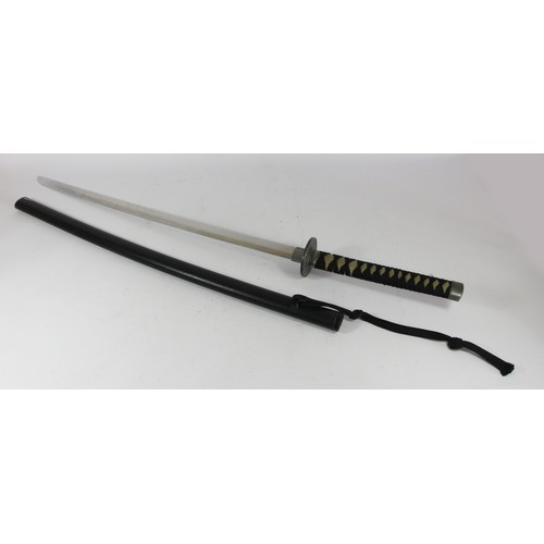 308 - A modern Samurai display sword with scabbard and stand, length of blade 71cm
This bladed product is ... 