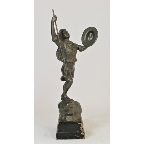 322 - A mid 20th century spelter Scouts trophy / figurine of a young boy scout reaching the peak of a moun... 