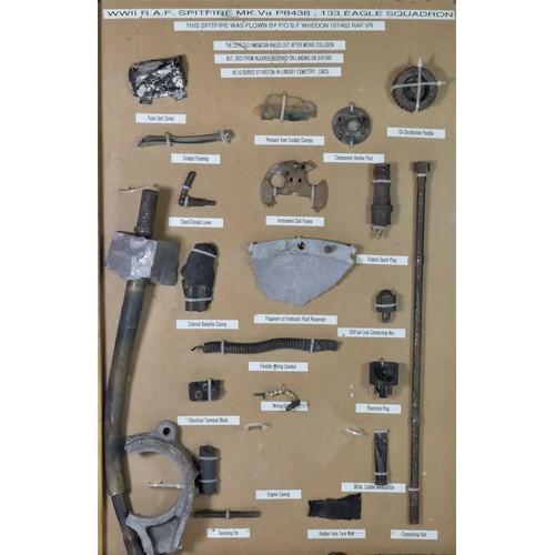 325 - WWII Spitfire Mk Va memorabilia, mounted on a board, stating that the bits were collected from a cra... 