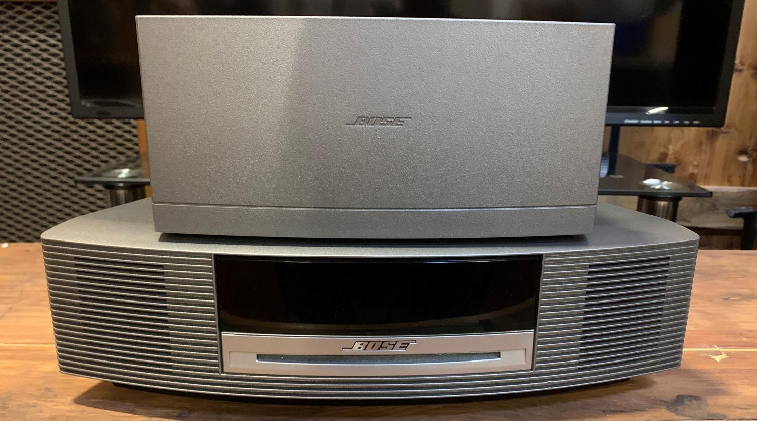 A Bose Wave music system, together with a Bose Wave DAB module, lacking ...