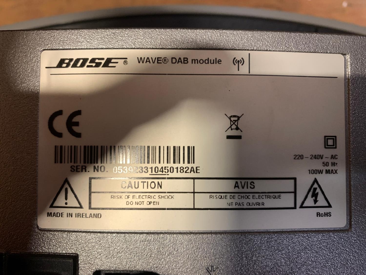 A Bose Wave music system, together with a Bose Wave DAB module, lacking ...