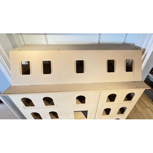 A substantial dolls house of 'Ashcroft Hall' made by The Dolls House