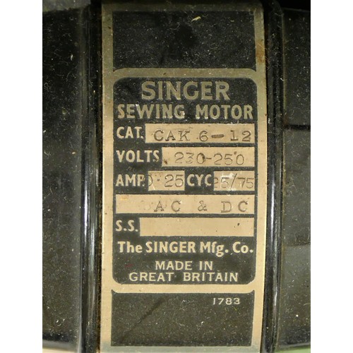 37 - A Singer sewing machine (Cat No CAK 6-12), with accessories and carry case, together with a New Home... 