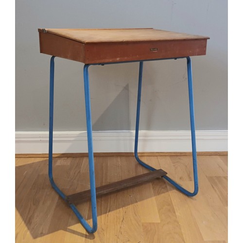 55 - A child's Tri-ang writing desk, pine with hinged top, on painted metal legs, blue, 50cm x 68cm x 42c... 