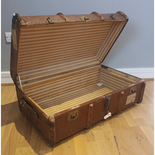 56 - A large travel trunk, wooden band strapping, with Orient Line and London & North Eastern Railways 