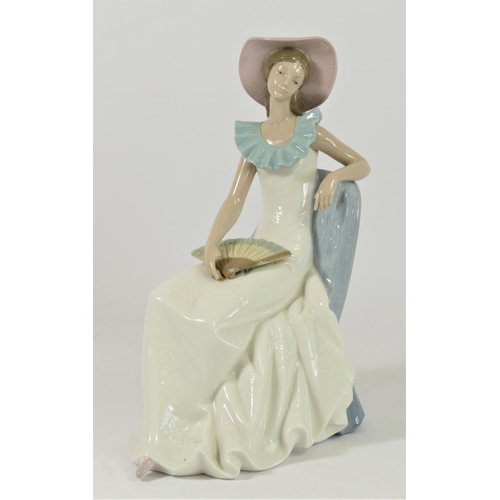 Three Nao by Lladro figurines of ladies to include, Lady with Fan