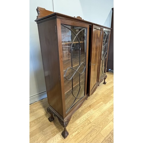 409 - A mahogany display cabinet, having astragal glazed doors to each side to reveal three adjustable she... 