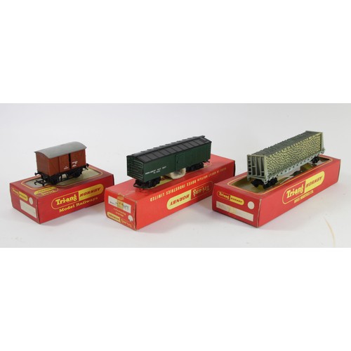 18 - Three Tri-Ang OO gauge model railway wagons to include, R.11A good van, R.235 pulp wood car, R.344 t... 