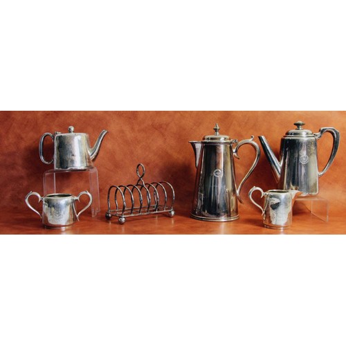 56 - A collection of table silver from railway company steamers to include, an L.M.S coffee pot, an L.M.S... 