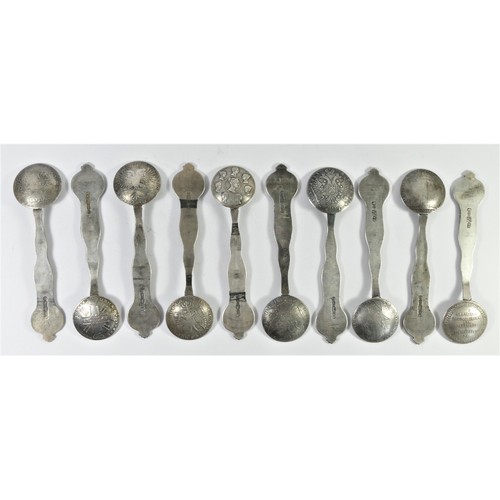 26 - A base metal set of ten Russian style coin spoons, bearing pseudo silver hallmarks, each with a diff... 