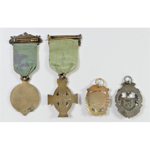 71 - Four silver & Enamel Royal Masonic Institution for Boys jewels (4) 78gm.