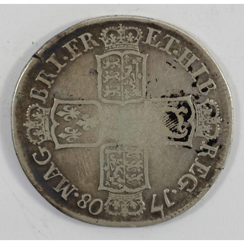 128 - Queen Anne, half crown, 1708, E below bust, F.
Queen Anne Half Crowns were minted between 1703 and 1... 