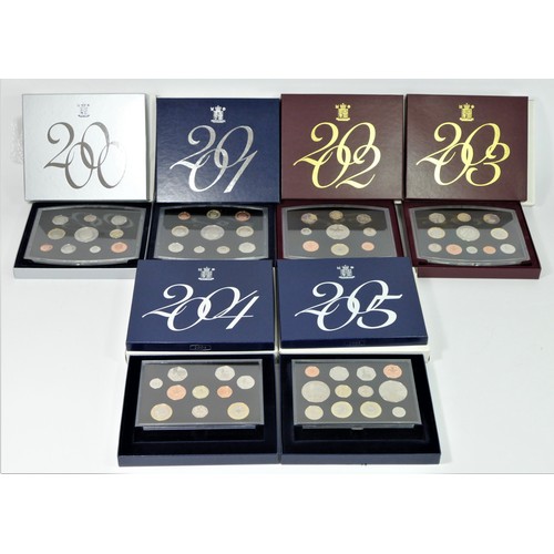 145 - Seven Royal Mint coin proof sets, 2000 - 2006 (7).
