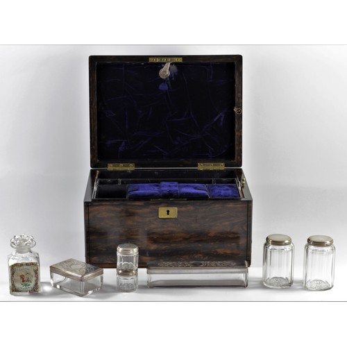 180 - A Victorian coromandel wood travelling vanity case, the hinged lid revealing a drop down letter rack... 