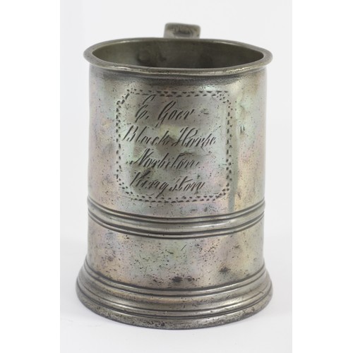 193 - A Victorian pewter quart tankard, of tapering form with waist band, engraved G. Goer, Black Horse, N... 
