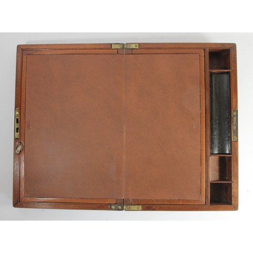 197 - A brass bound mahogany campaign writing slope, circa 1880s, having hinged lid, opening to reveal ins... 