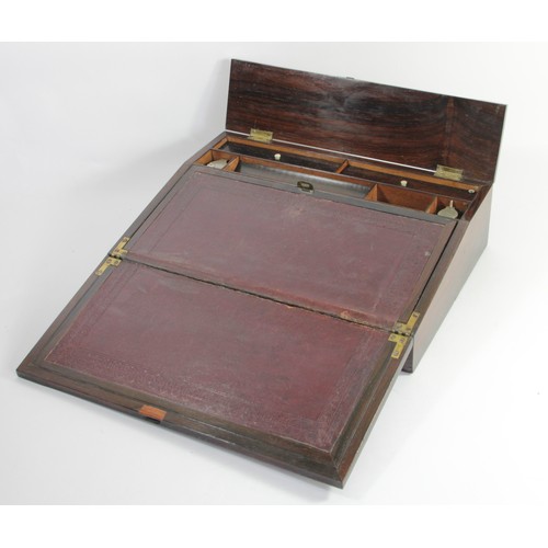 202 - A 19th century rosewood writing slope with mother of pearl floral decoration to the hinged top, open... 