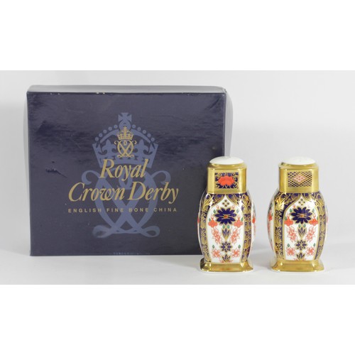 227 - A pair of Royal Crown Derby Imari palette 1128 pattern salt and pepper pots, 10cm, printed marks, go... 