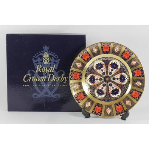 228 - A Royal Crown Derby Imari 1128 pattern dinner plate, gold banded, printed marks, boxed, 27cm