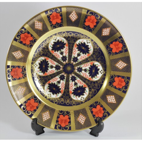 229 - A Royal Crown Derby Imari 1128 pattern dinner plate, gold banded, printed marks, boxed, 27cm