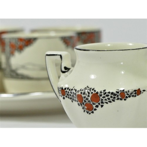 245 - A Crown Ducal Art Deco Orange Tree (A1211) pattern part breakfast service to include, four egg cups ... 