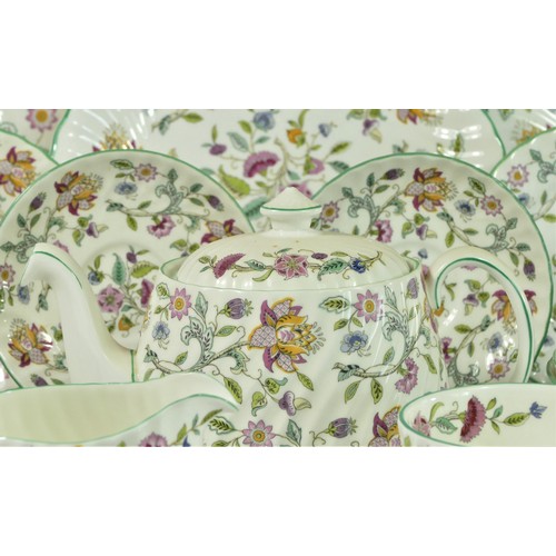 253 - A Minton Haddon Hall tea service for six place settings, to include, a platter (27 cm), bon bon dish... 