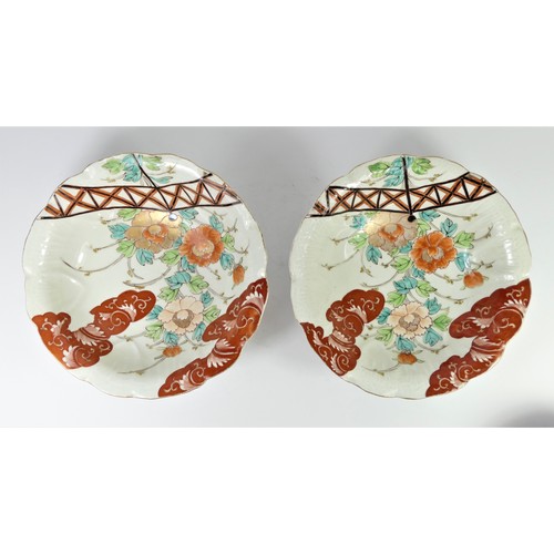 276 - A Japanese Meiji period pair of Kakiemon bowls, with impressed body and floral decoration, diameter ... 