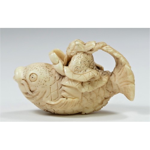 280 - A Meiji period carved ivory netsuke of a wise man riding a fish, signed, 5.5cm