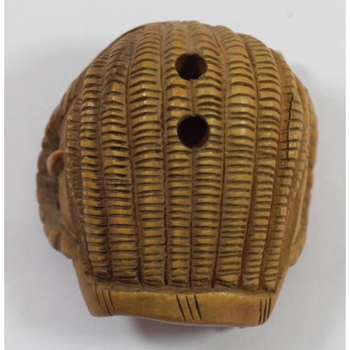 285 - A Japanese wood netsuke of two mice in a basket, signed, 4cm and three other wooden netsuke of mice,... 