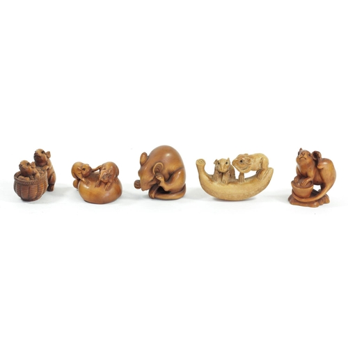 286 - A Japanese wood netsuke of two mice on a mushroom, signed, 4cm and four other wooden netsuke of mice... 