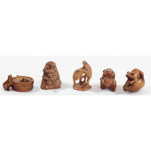 288 - A Japanese wood netsuke of three frogs in a bucket, signed, 5.5cm, three other wooden netsuke of fro... 