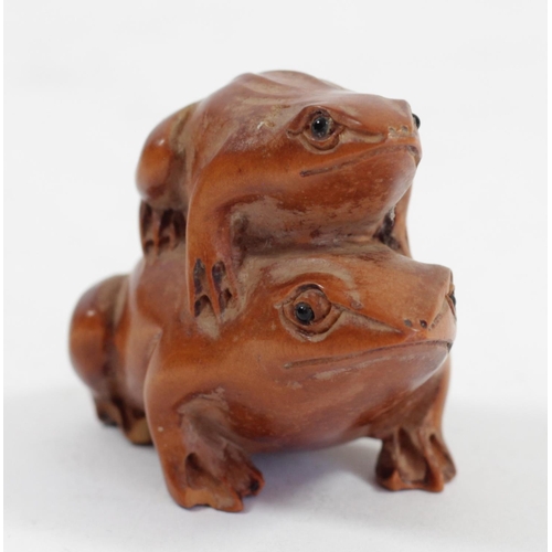 288 - A Japanese wood netsuke of three frogs in a bucket, signed, 5.5cm, three other wooden netsuke of fro... 