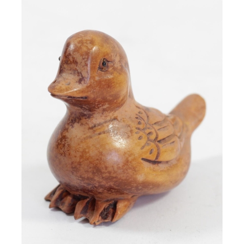 294 - A Japanese wood netsuke of a chick by an egg with another inside, signed, 5cm, and four other wooden... 