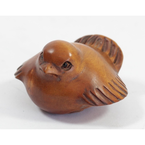 294 - A Japanese wood netsuke of a chick by an egg with another inside, signed, 5cm, and four other wooden... 