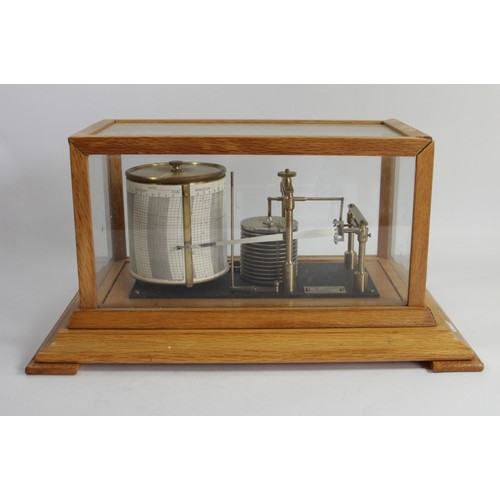 302 - Negritti & Zambra, London, a mid 20th century light oak barograph, serial number R/45191, range 28.3... 