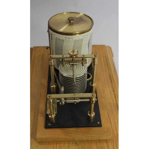 302 - Negritti & Zambra, London, a mid 20th century light oak barograph, serial number R/45191, range 28.3... 