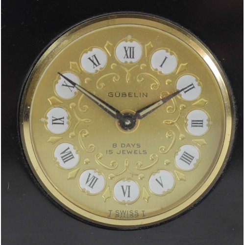 306 - Gubelin, a gilt brass and black lacquer 8 day manual wind alarm clock, numbered 665387, 9.5 x 7cm.